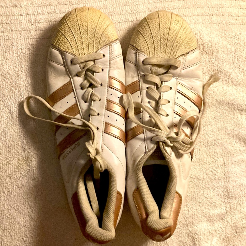 Adidas gold and white superstar shoes